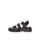 Sandales Adonis Noir André en cuir noir avec semelle plateforme crantée et brides à boucles réglables pour femme