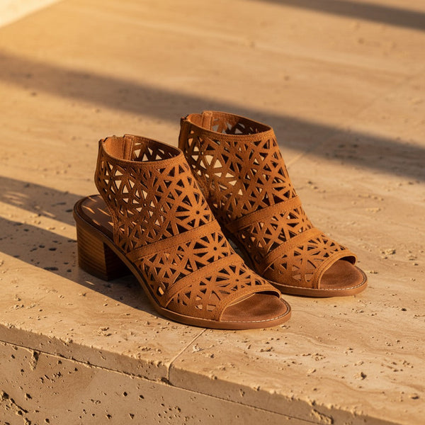 André Carioca camel suede leather open-toe sandals with geometric cut-outs and a 5cm block heel.