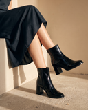 Boots FLORENCE noires portées, cadrage jambes