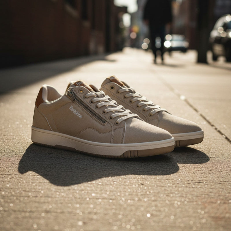 André Gobat beige suede sneakers with camel heel and tongue details and side zip.